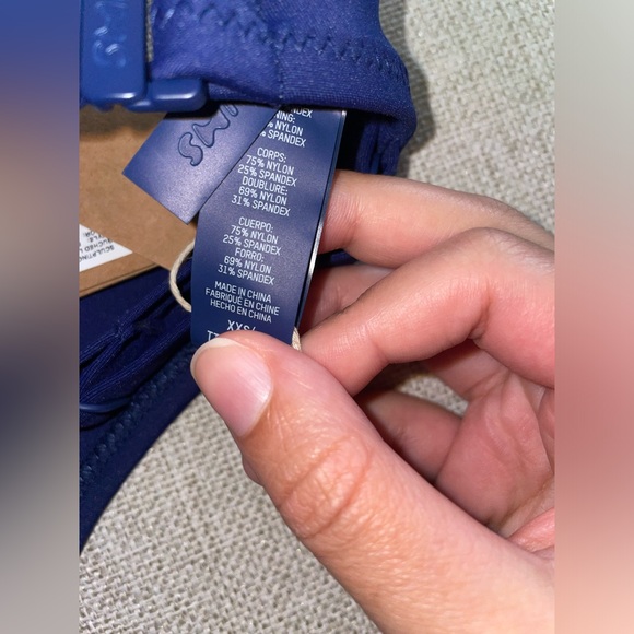 4. SKIMS Sculpting Swim Ruched Top - Picture 6 of 7